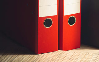 Two red file boxes.